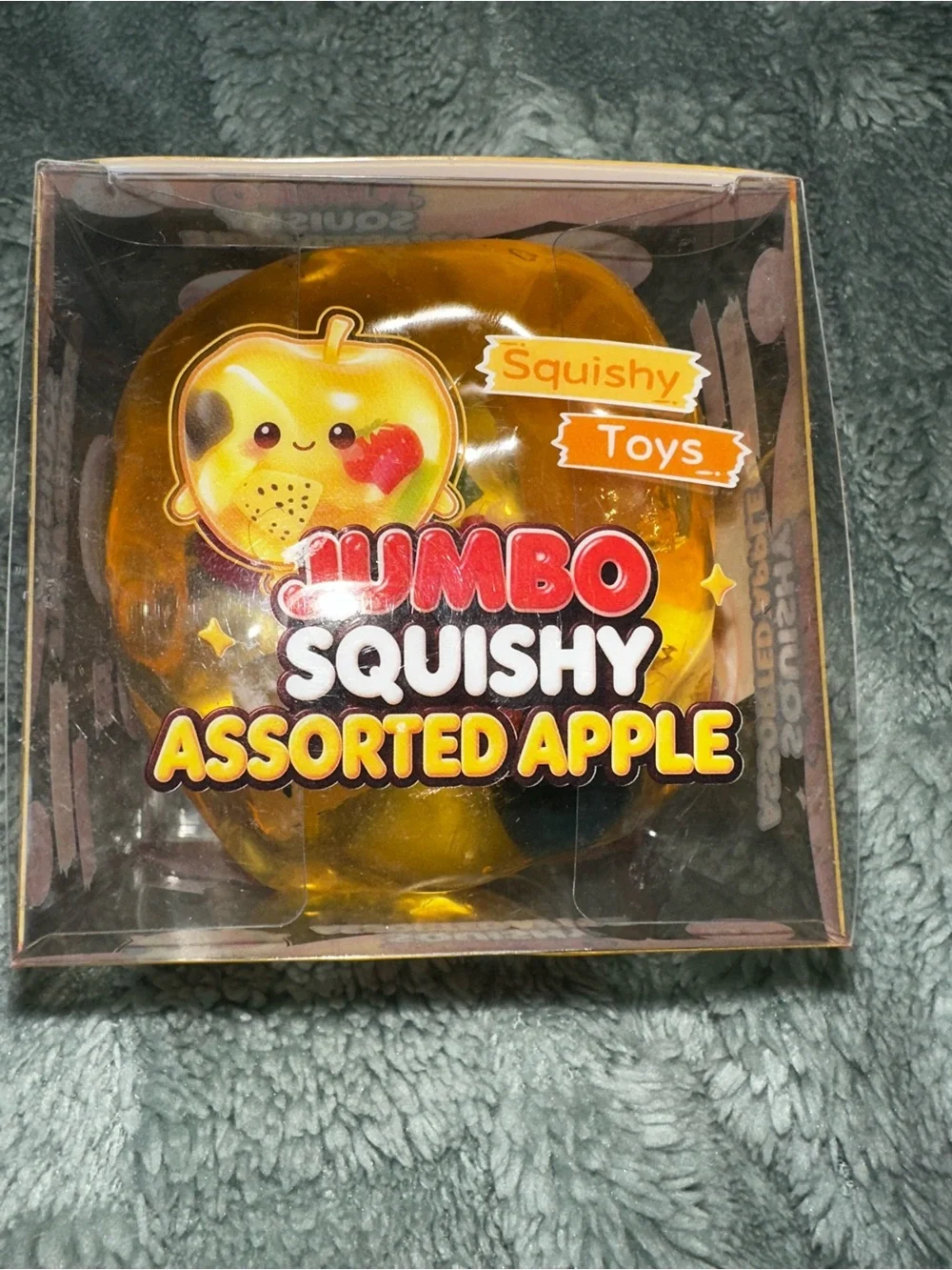 Big coconut oil squishy with embedded fruit charms.